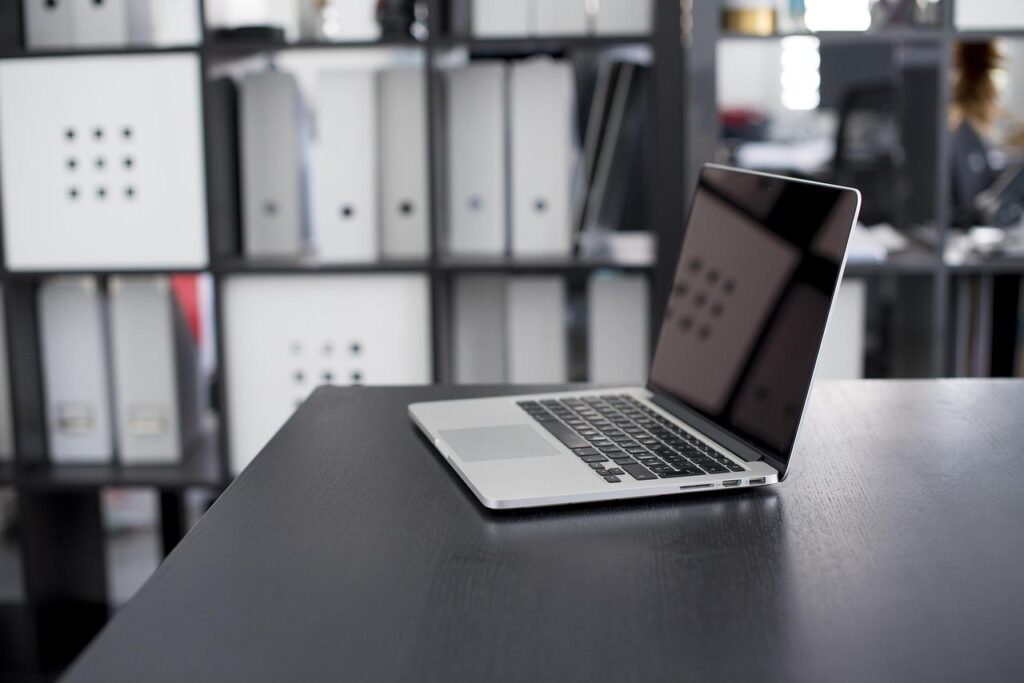 A computer on a deskAI-generated content may be incorrect.